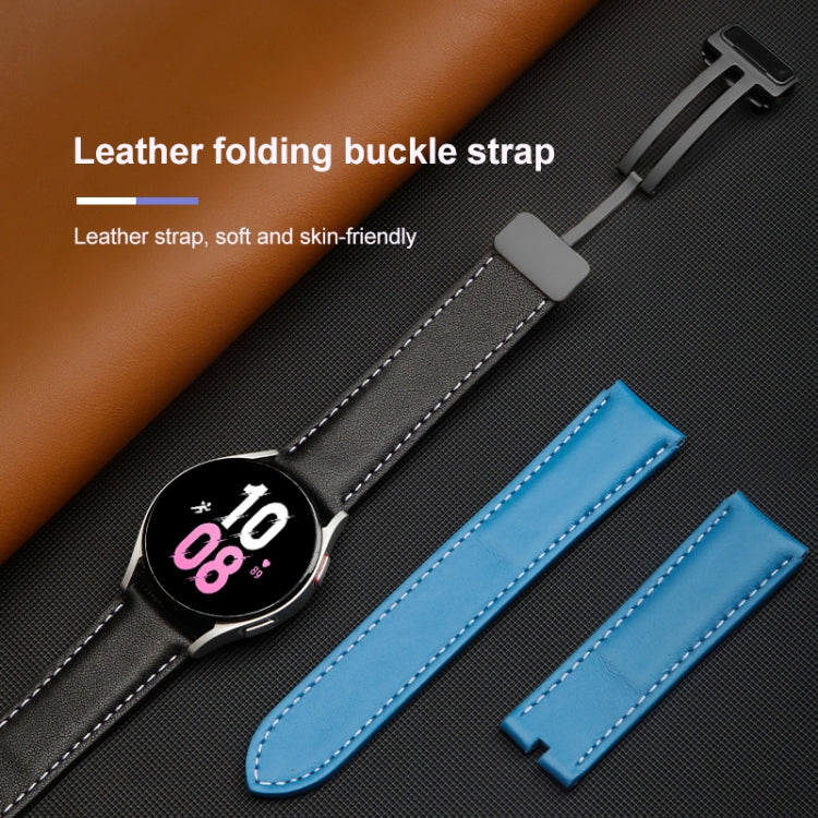 Brown genuine leather watch band with folding buckle and stitched edge; blue band shown