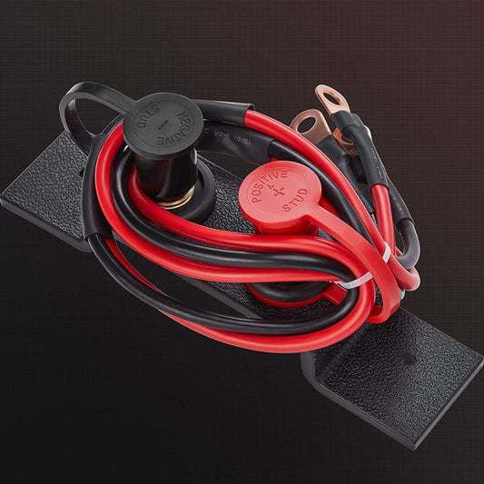 Car battery jumper starter with red and black cables and ring clamps