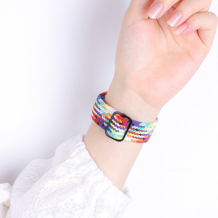 Rainbow nylon braided watch band with metal buckle on wrist