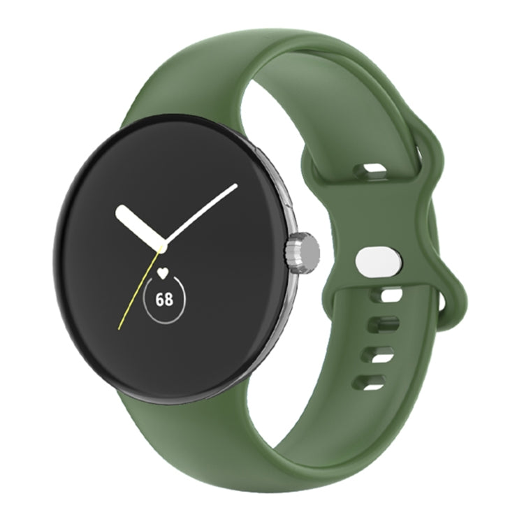 Light green silicone watch band with perforated holes and clasp, shown on a round watch case.