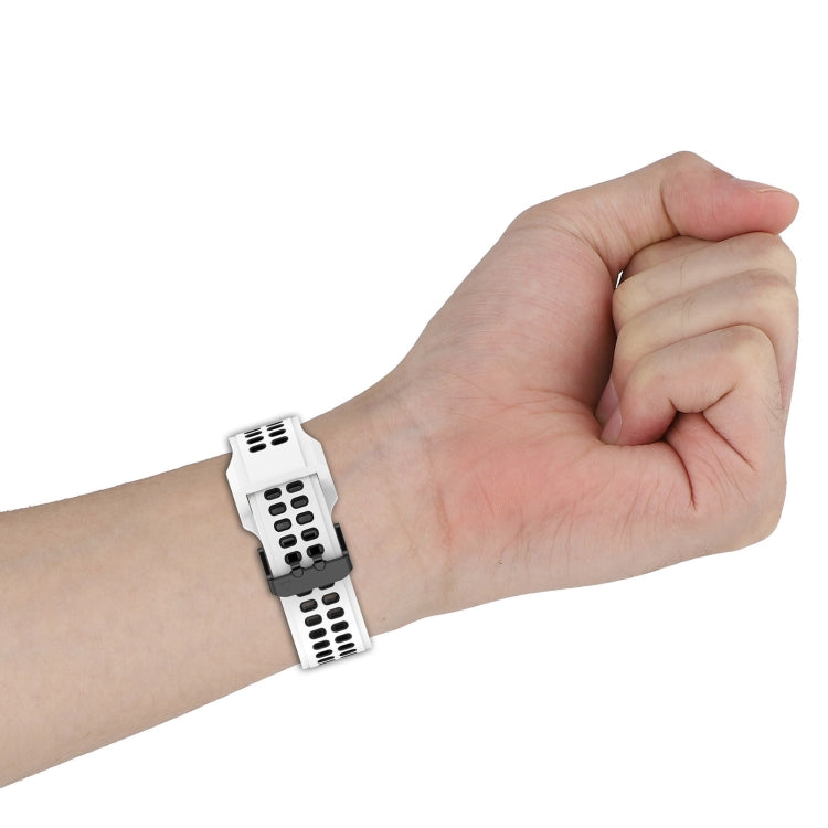 Two-color silicone watch band close-up, white perforated strap with dark underside buckle
