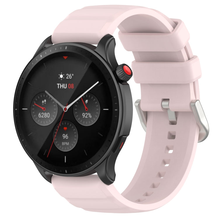 Light pink silicone watch band with metal buckle and adjustment holes