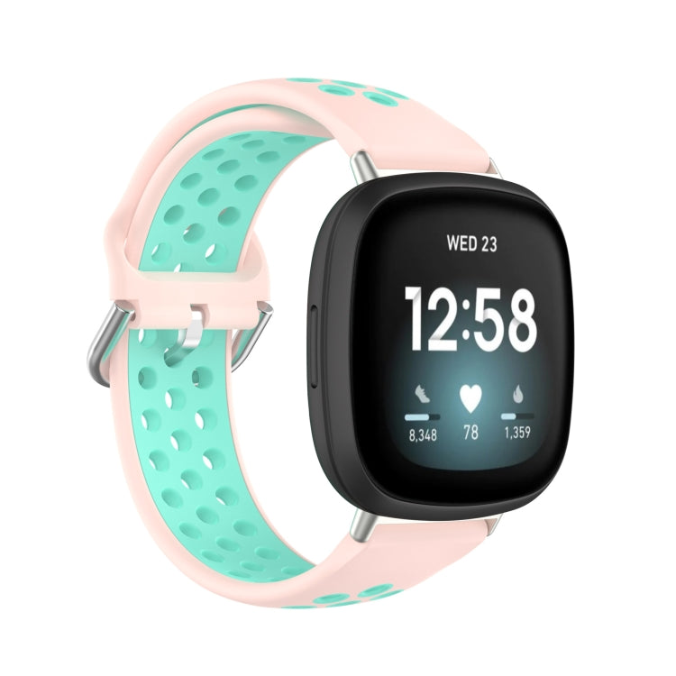 Dual-color silicone watch band with pink outer strap and mint perforated inner strap