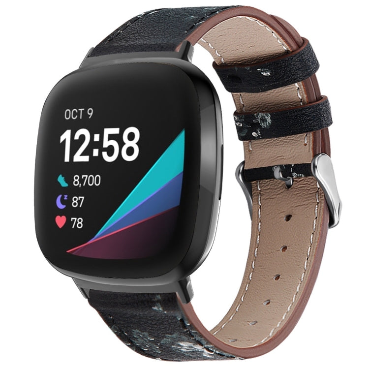 Dark gray leather watch band with stitched holes and silver buckle for smartwatch.