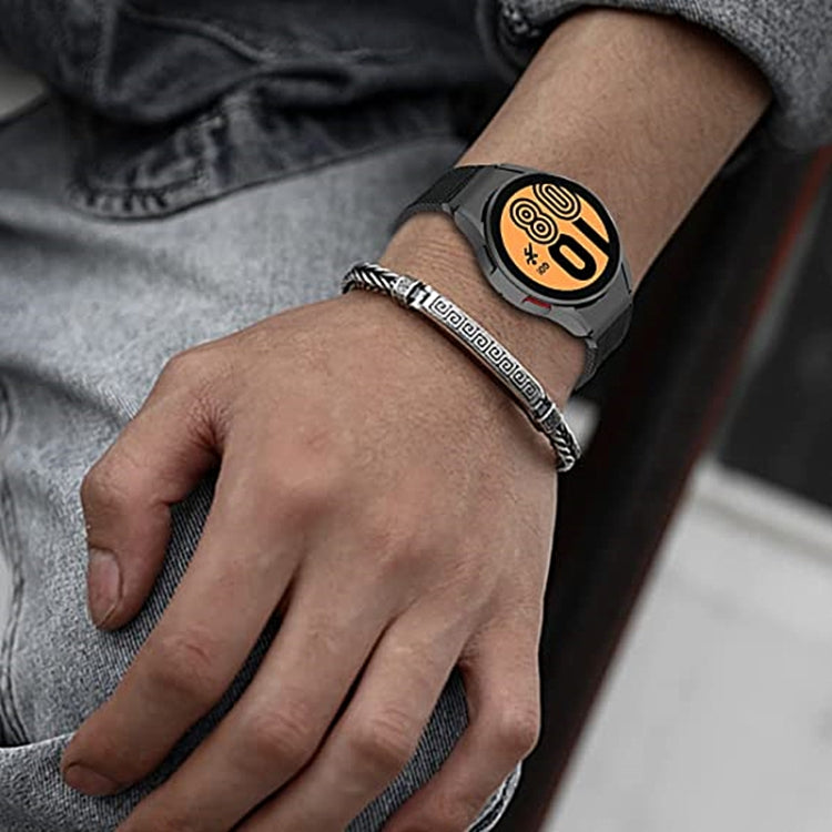 Black three-ring nylon watch band on wrist with round smartwatch display