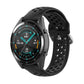 Black sport watch strap with perforated band and metal buckle clasp