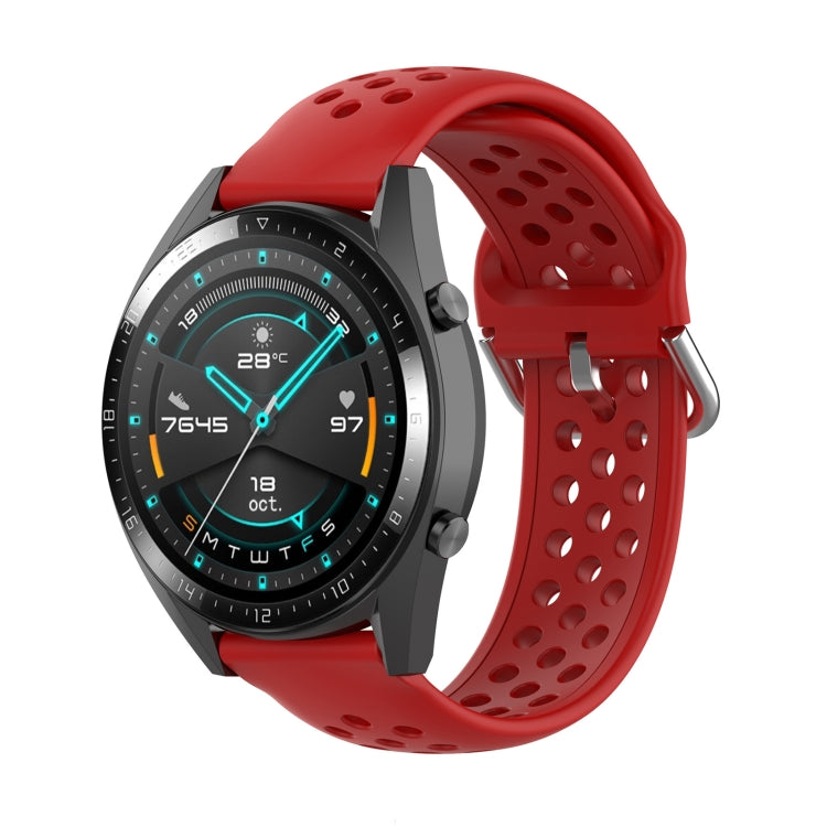 Red silicone sport watch strap with perforated design and metal clasp for secure fit