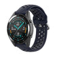 Navy silicone sport watch strap with perforated holes and metal clasp for secure fit