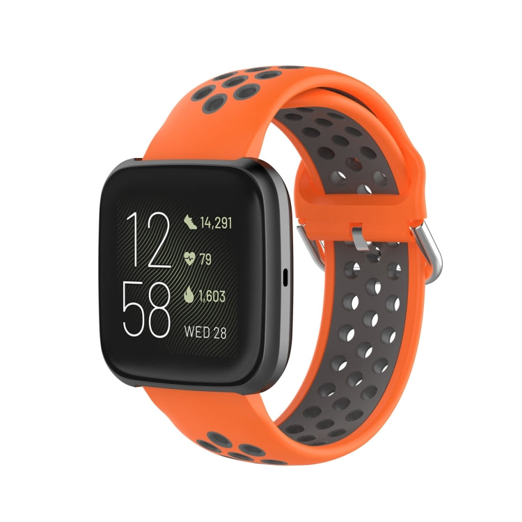 Orange-and-gray perforated sport watch band with metal clasp and black watch face