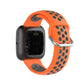 Two-color sport watch band in orange and gray, clasp and perforated underside view