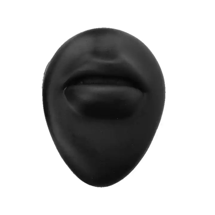Black silicone facial feature insert with horizontal slit indentation