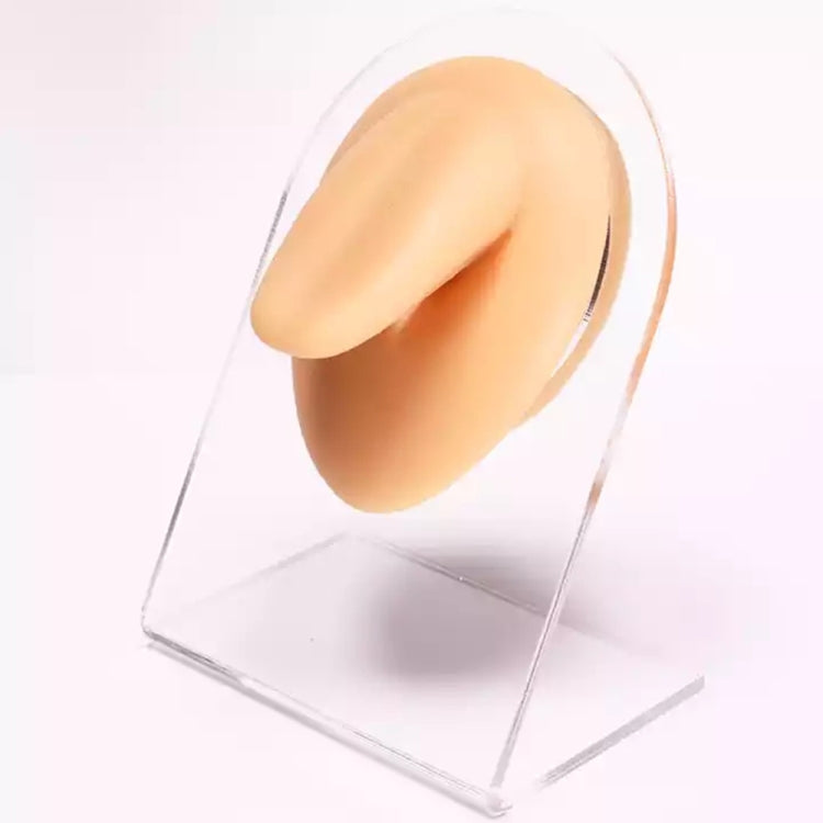 Flesh-colored silicone nose feature with visible nostril opening.