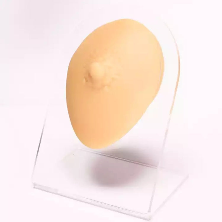 Flesh-colored silicone nose feature with visible nostril opening.