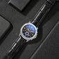 Men's multifunction watch angled view with black leather strap and blue-accent dark dial.