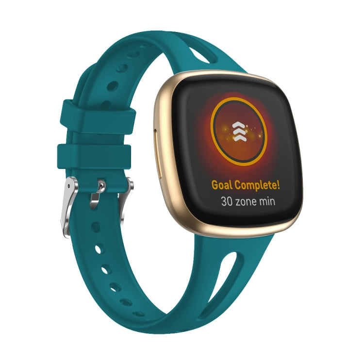 Teal silicone slim watch band for Fitbit Versa 3/4, front view with metal buckle
