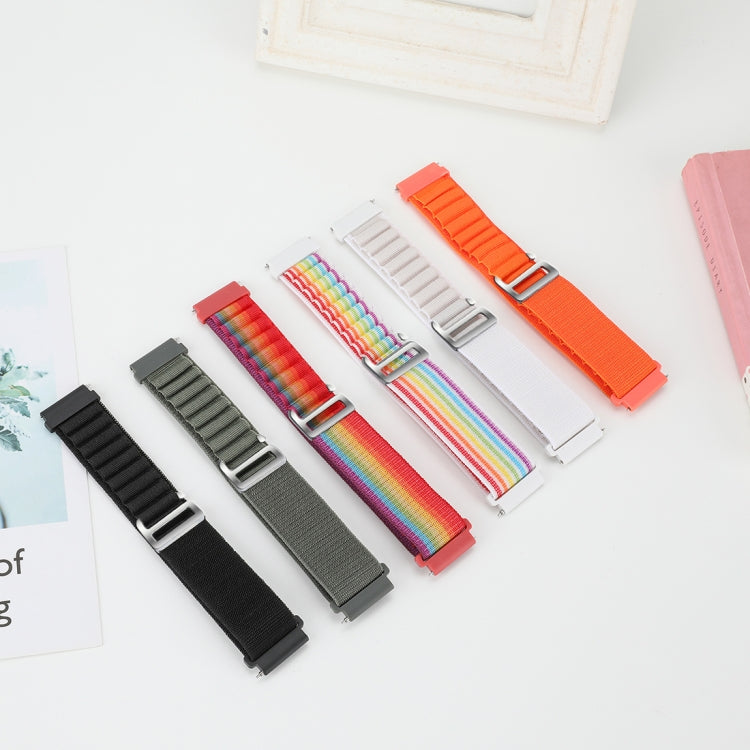 Nylon loop watch bands set with metal clasp in orange, black, green, and rainbow stripes