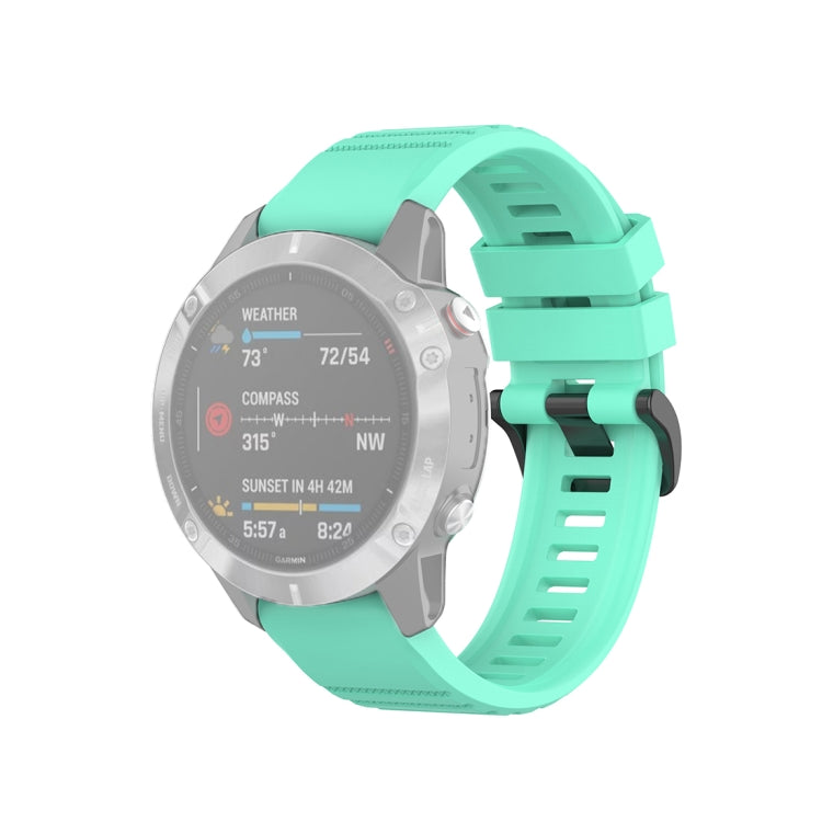 Mint green 22mm textured watch strap with plastic quick-release buckle, front view