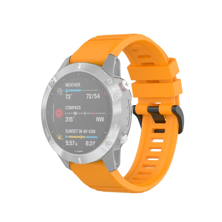 Orange 22mm textured watch strap with plastic quick-release buckle, front view