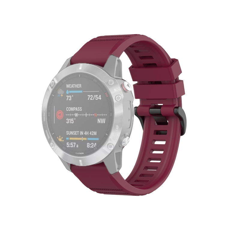 Wine red 22mm textured watch strap with plastic quick-release buckle, front view