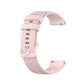 Rose pink 20mm silicone watch strap with small plaid texture, side view of buckle