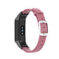 Pink leather watch strap with white buckle and metal pin clasp