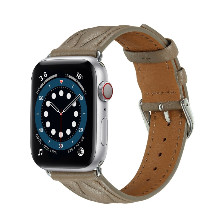 Leather Apple Watch strap in taupe with brown buckle and stitch detail.