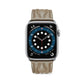 Light beige leather Apple Watch strap with stitched texture and metal buckle.
