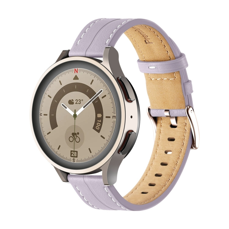 Purple fluted leather watch band with stitched holes and buckle, tan lining.