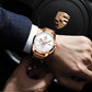 Men's rose gold quartz watch with white dial and steel link bracelet