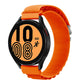 Orange nylon watch band with metal clasp, shown with a smartwatch display