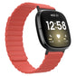 Coral red silicone magnetic watch band with ridged links for smartwatch.