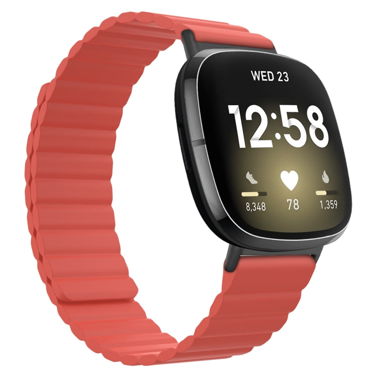 Coral red silicone magnetic watch band with ridged links for smartwatch.