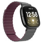 Silicone magnetic watch band, wine red with gray clasp, on a smartwatch with black display