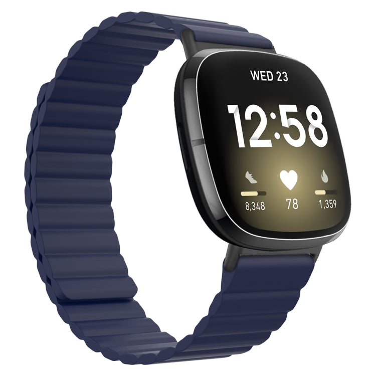 Silicone magnetic watch band, navy blue with gray clasp, on a smartwatch with black display