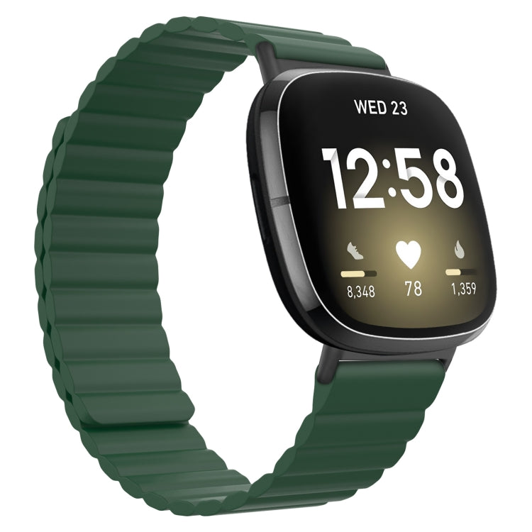 Silicone magnetic watch band, green with gray clasp, on a smartwatch with black display