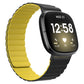 Yellow silicone magnetic watch band with ridged strap and black clasp end.