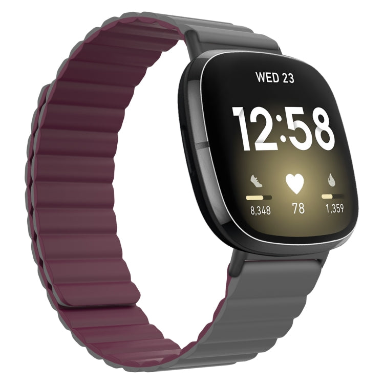 Wine red silicone magnetic watch band with gray clasp, smartwatch with black screen shown