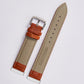 Light beige crocodile-texture leather watch band with silver buckle and orange inner strap