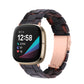 Universal resin watch band with dark tortoise links and pale pink strap section
