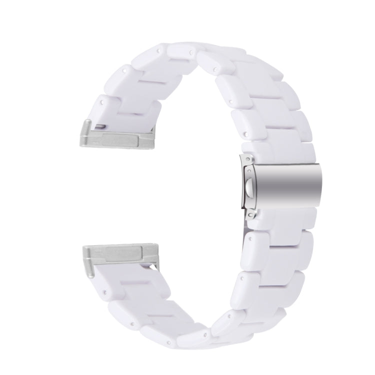 White resin watch band with linked segments and metal clasp
