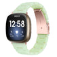 Light green resin watch band with rose-gold clasp and smartwatch display