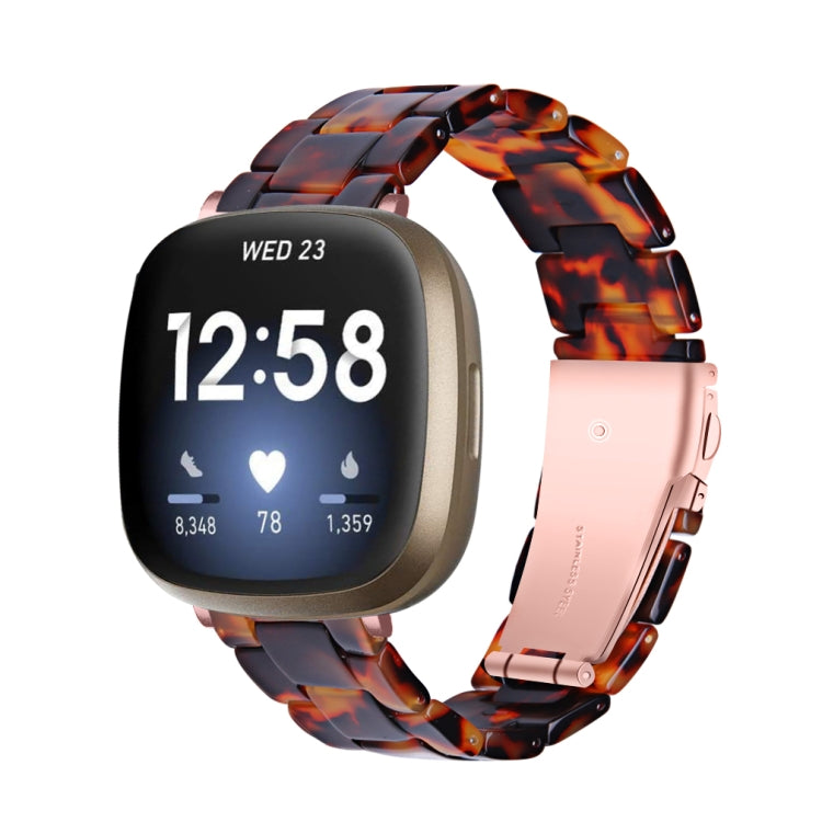 Tortoise-shell resin watch band with metal-toned clasp and sculpted links for Fitbit Versa