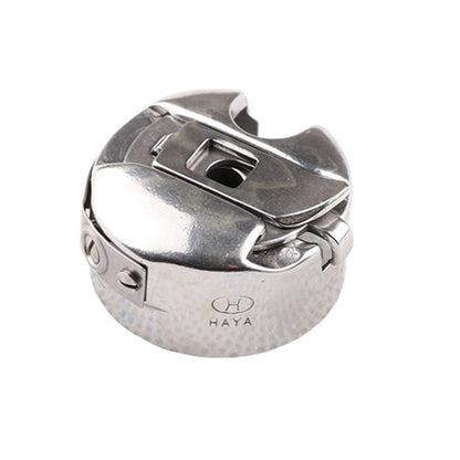 Silver sewing machine flat bobbin case with latch and HAYA logo
