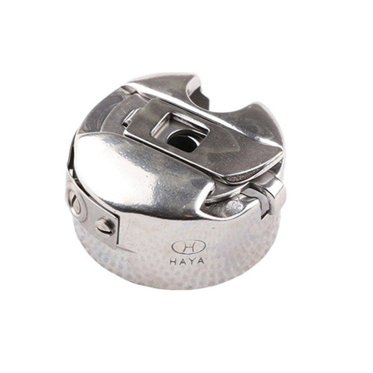 Metallic sewing machine flat bobbin case with latch and HAYA logo