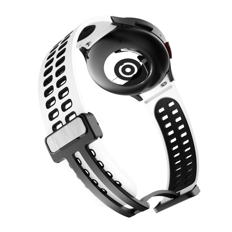White silicone watch band with double-row holes and fold-over buckle, black hardware.