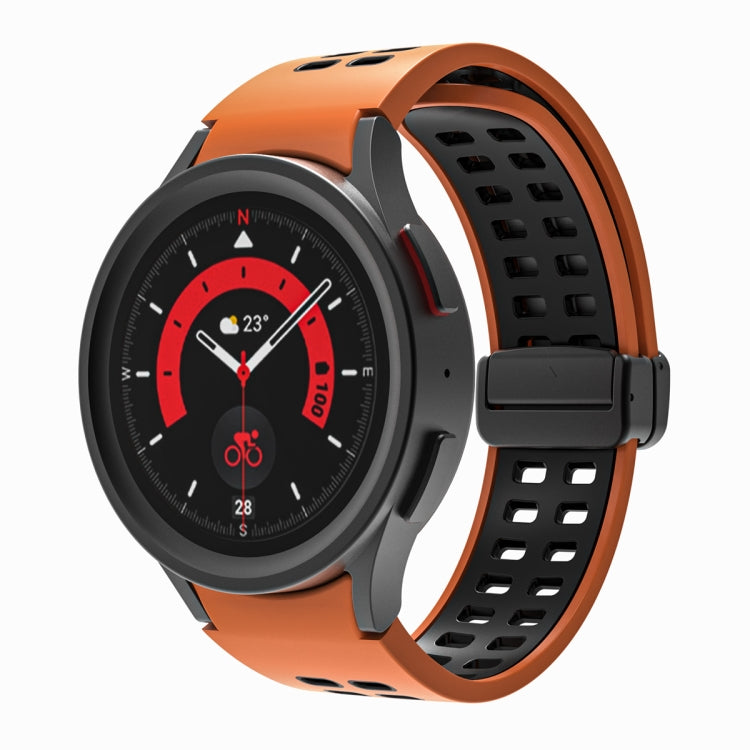 Orange silicone watch band with double-row holes and fold-over buckle, black clasp.