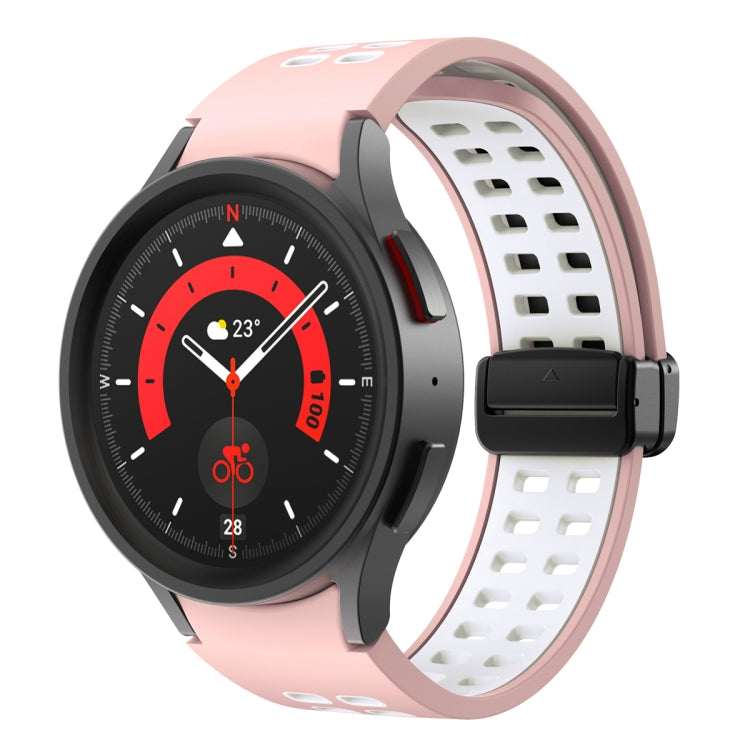 Pink silicone watch band with double-row holes and fold-over buckle, black clasp.