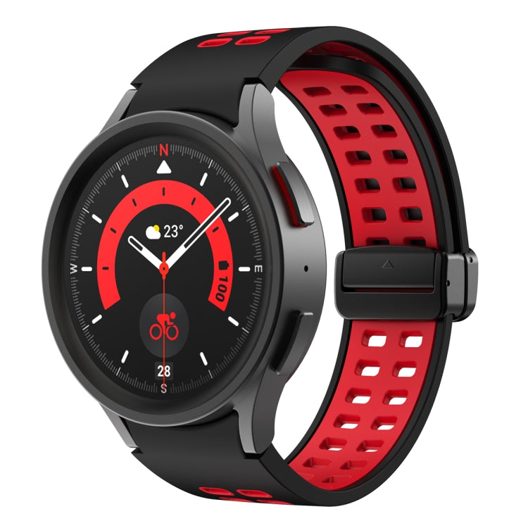 Black silicone watch band with double-row holes and fold-over buckle, red accents.