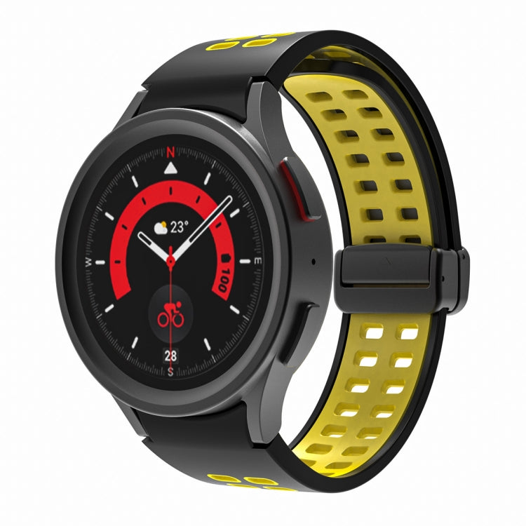 Yellow silicone watch band with double-row holes and fold-over buckle, black clasp.