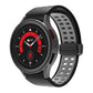 Black silicone watch band with double-row holes and fold-over buckle, light gray clasp.